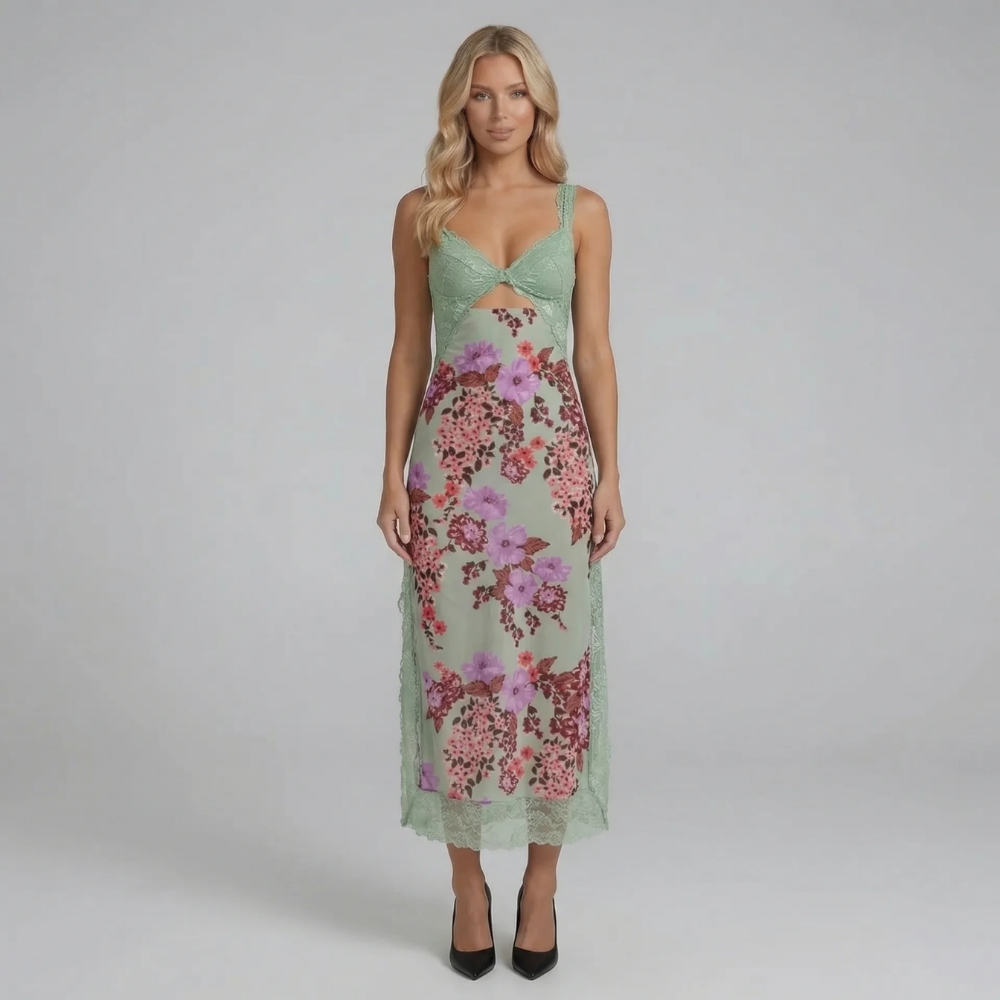 Green floral lace midi dress — front view showing romantic lace and flowing floral skirt.