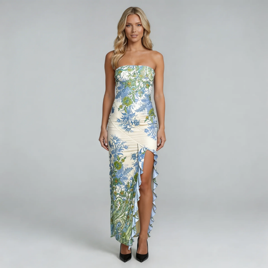 Green floral print strapless maxi dress with thigh-high ruffle slit — front view on model.