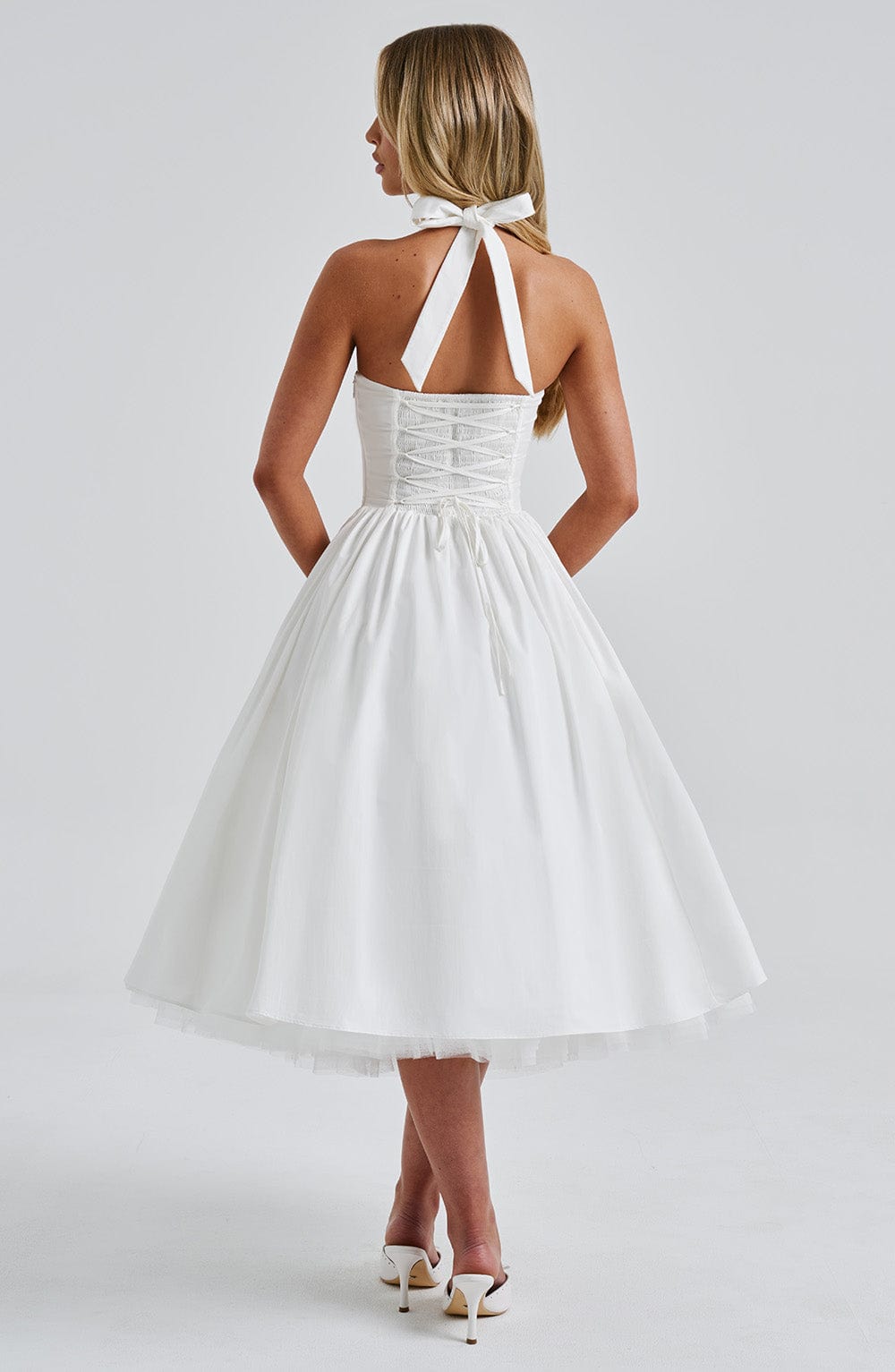 Women ivory halter midi dress, side view
