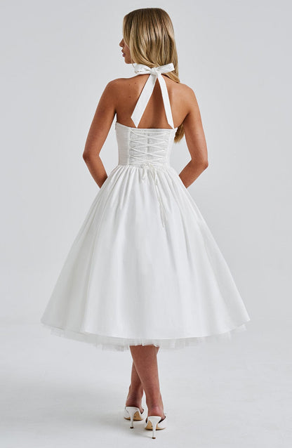 Women ivory halter midi dress, side view