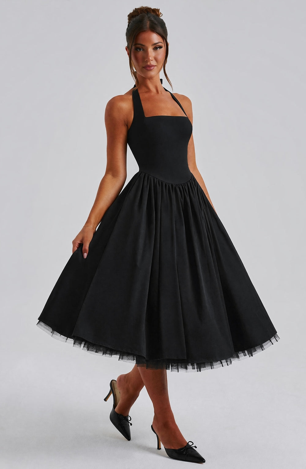 Women black halter midi dress, back view
