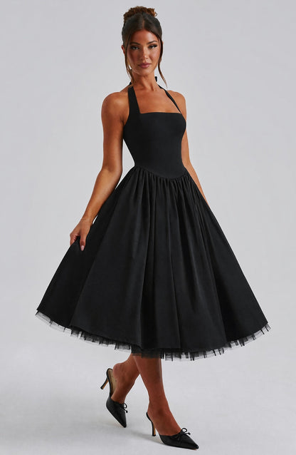 Women black halter midi dress, back view