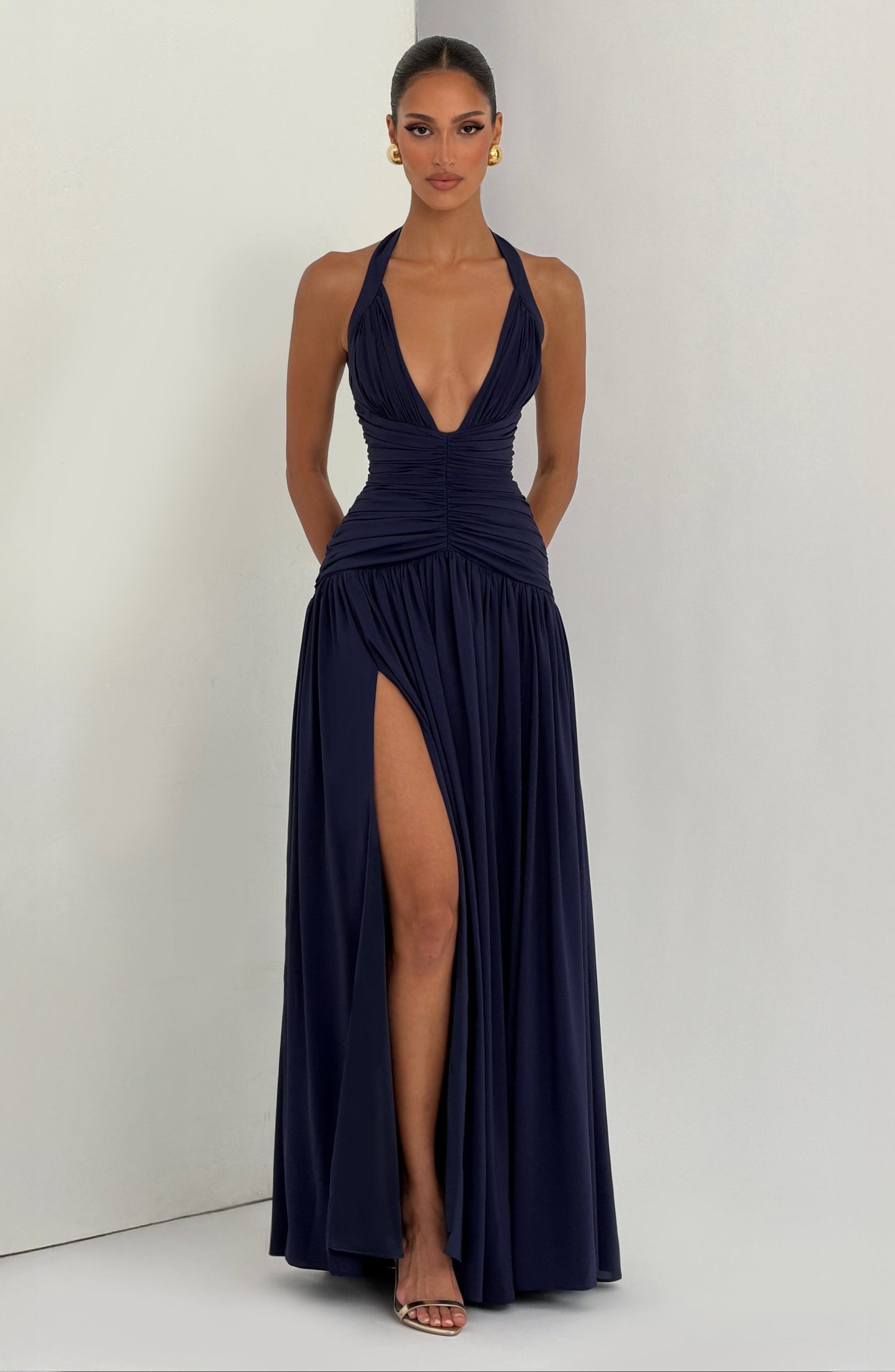 Women navy halter maxi dress, side view