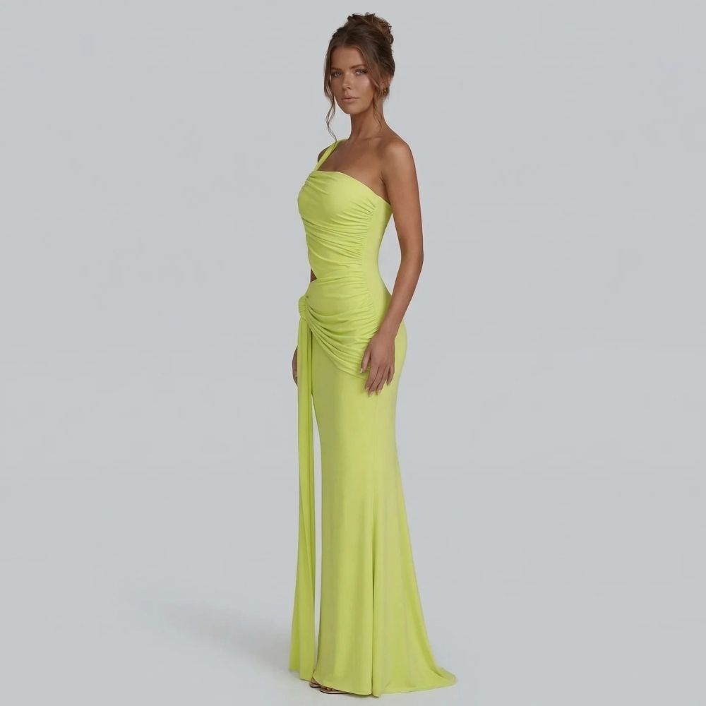 Side view of sage cutout maxi dress showing waist detail and ruching