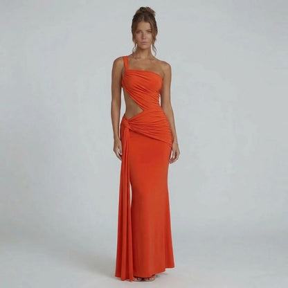 Orange cutout maxi dress with one-shoulder neckline showcasing bold design