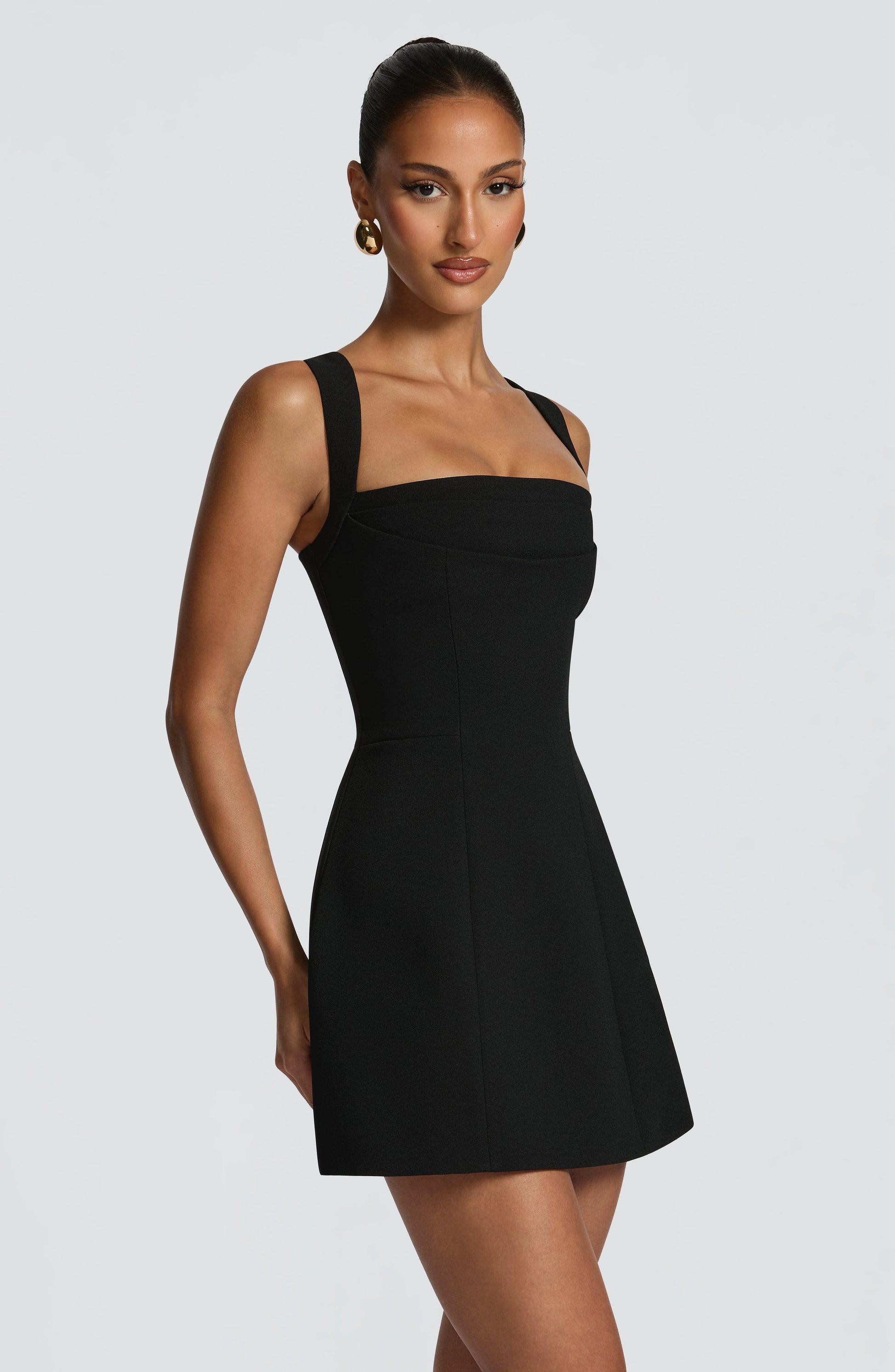 Women black square neck mini dress, side view