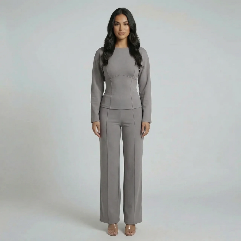 Grey tailored set — front view showing sculpted seaming on top and comfortable wide-leg trousers.