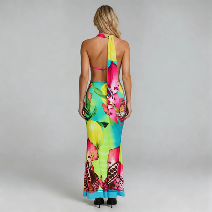 Multicolor tropical halter top and high-slit maxi skirt — back view showing open tie detailing.