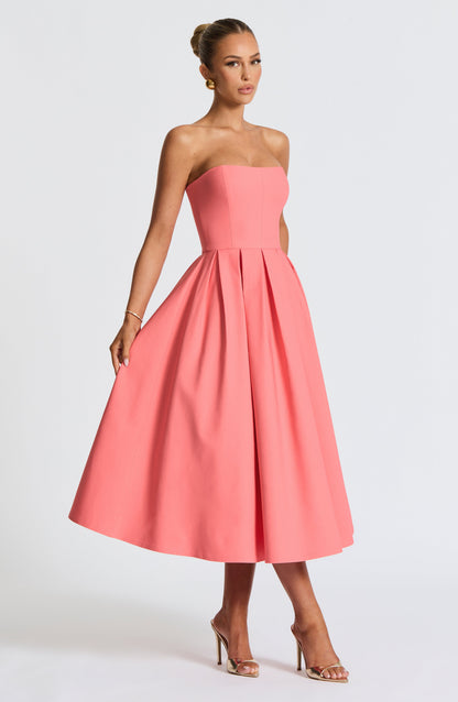 Women pink strapless midi dress, side view