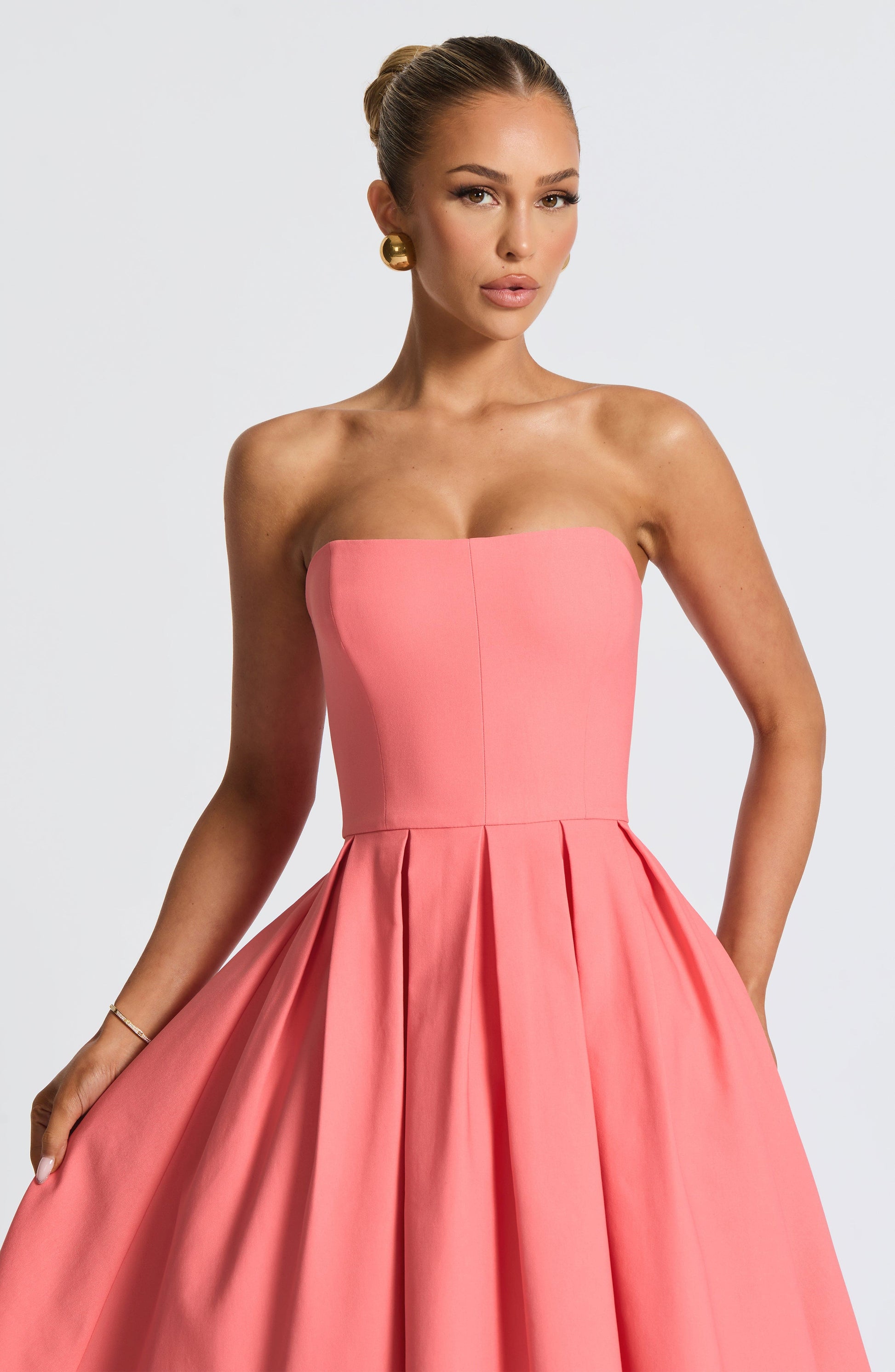 Women pink strapless midi dress, back view