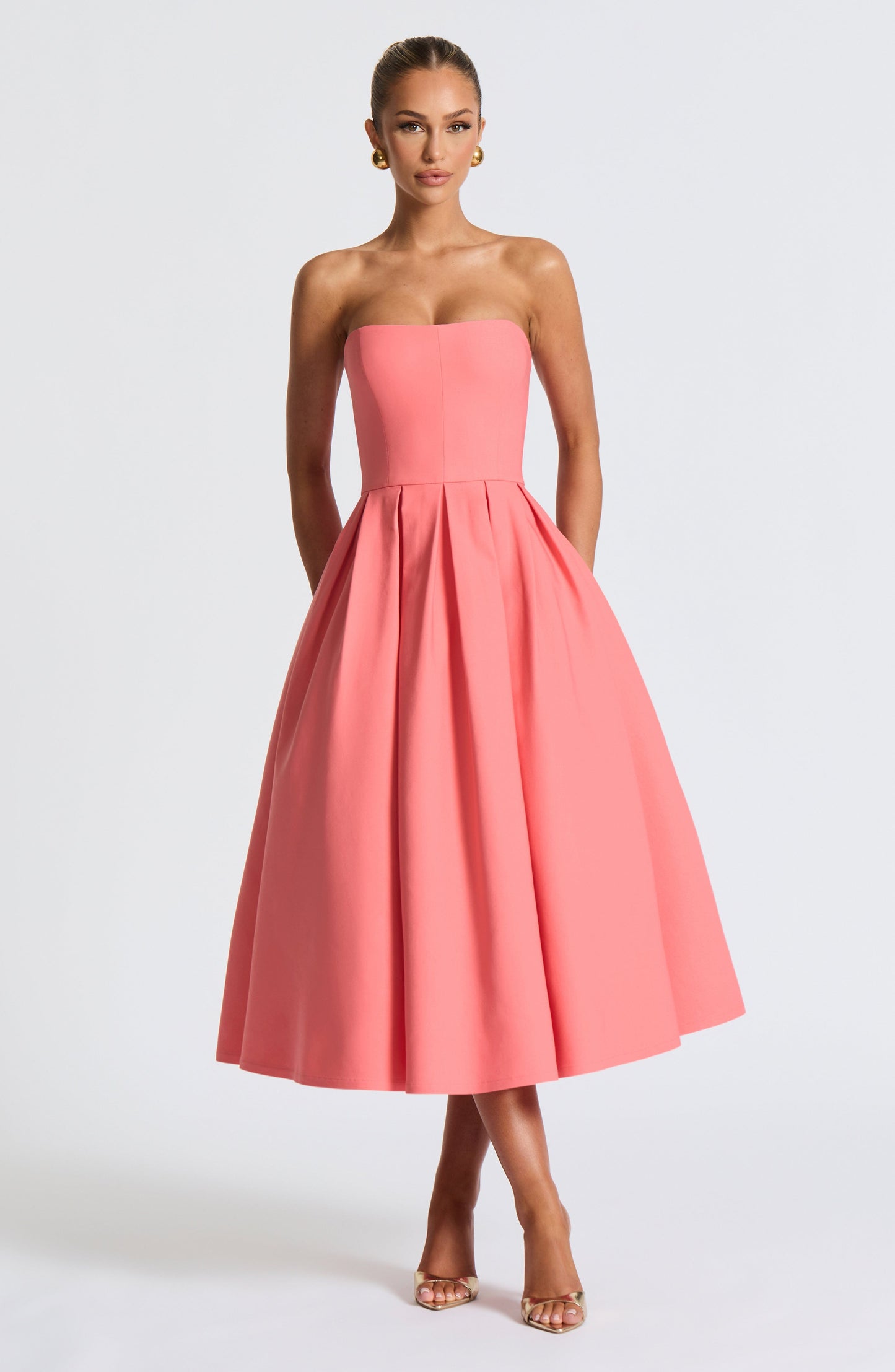 Women pink strapless midi dress, side view