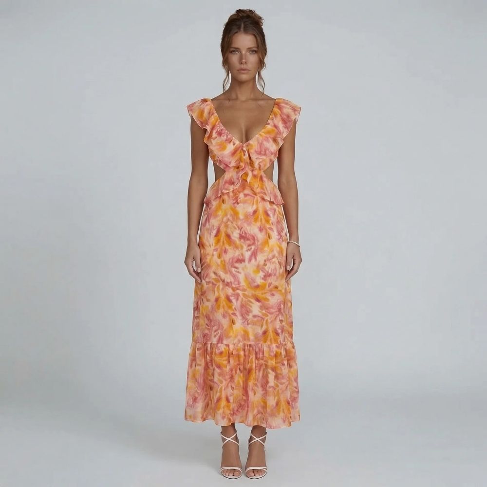 Orange watercolor ruffle maxi dress with tiered hem — front view showcasing neckline and full length