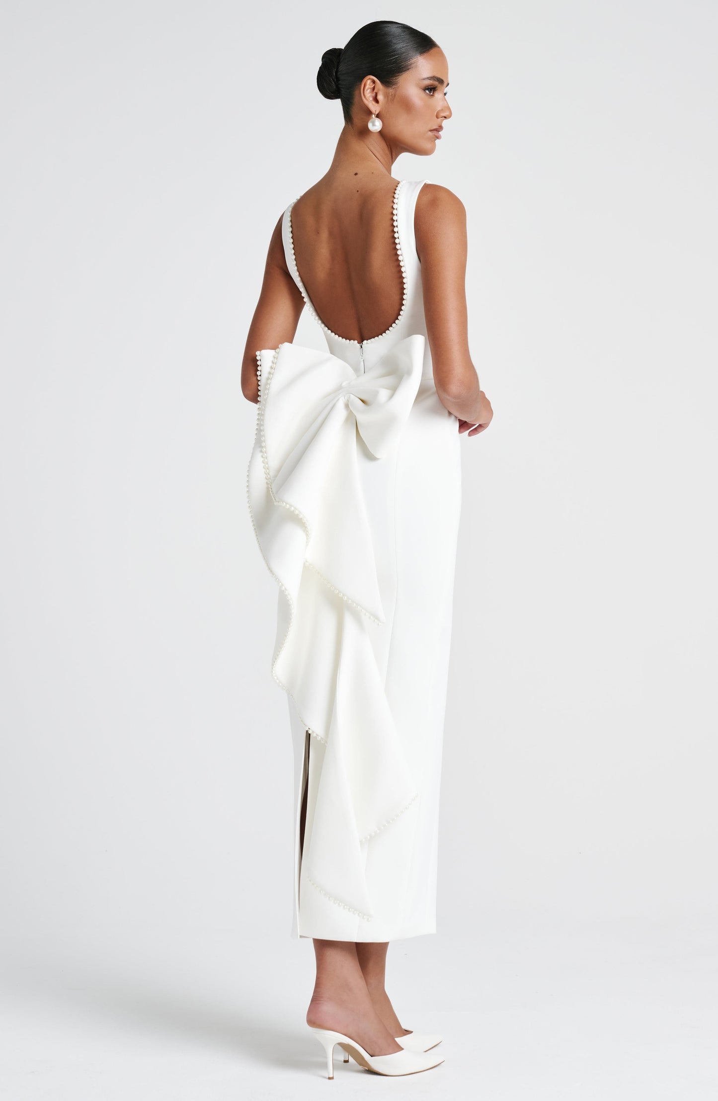 Women ivory bow maxi dress, side view