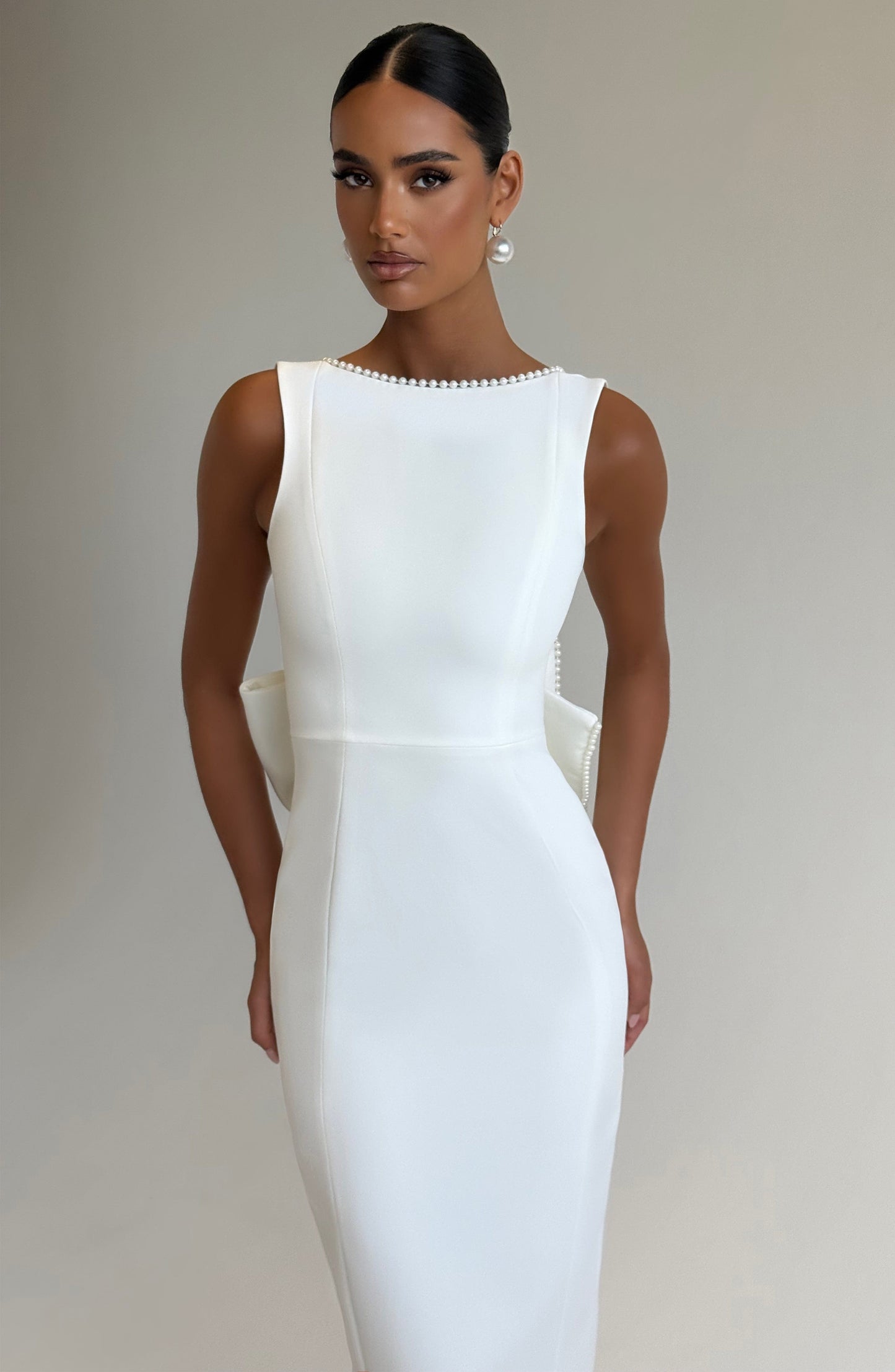 Women ivory bow maxi dress, side view