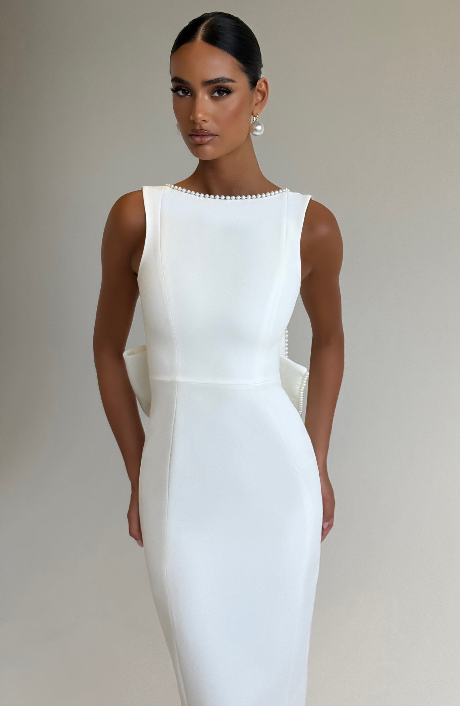 Women ivory bow maxi dress, side view