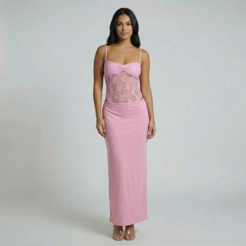 Pink lace corset maxi dress with sweetheart neckline — lifestyle shot showcasing soft lace detail.