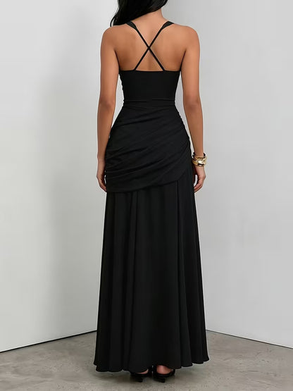 Women black ruched maxi dress with cross back straps and full floor length skirt